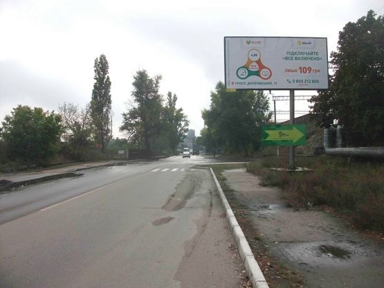 Фото рекламной плоскости по адресу м. Українка, перехрестя вул. Юності та автодороги Р-19 «Обухів-Українка»