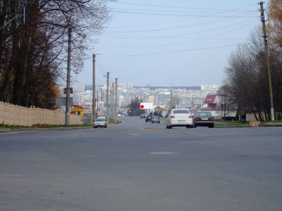 Фото рекламної площини за адресою вул.М.Рибалка (таможня). неподалік: АЗК "Укрнафта", цілодобова мийка, навколо елітна забудова м.р. "Отрадне", "Дивокрай", "Дихтярка" (від центру)