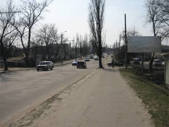 Фото рекламної площини за адресою Вул. Дружби біля МРЕО (виїзд з міста)