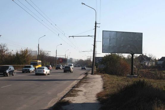 Фото рекламной плоскости по адресу П-т К. Володимира, міст через р.Протока по напрямку до вул. Леваневаневського (з центру)
