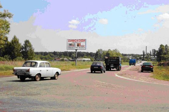 Фото рекламной плоскости по адресу перекресток Окружной и ул. Червоный шлях, напротив бензо-заправки, в направлении Киева