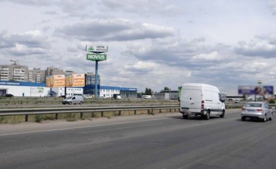 Фото рекламной плоскости по адресу Окружная 12/ Лерой Мерлин,супермаркет Новус (В) правый (напр.к Одесской пл)
