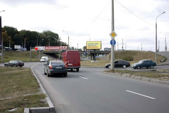 Фото рекламной плоскости по адресу розв'язка вул.Кам'янецька - вул.Толстого (зі сторони нового мосту) (від центру, на ринки) "A"