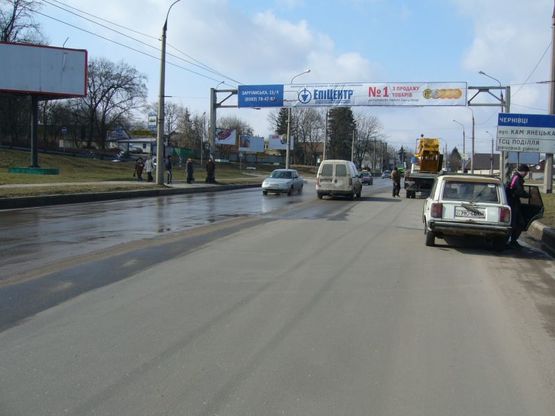 Фото рекламной плоскости по адресу розв'язка вул.Кам'янецька - вул.Толстого (зі сторони ринків) (від центру, на ринки) "A"