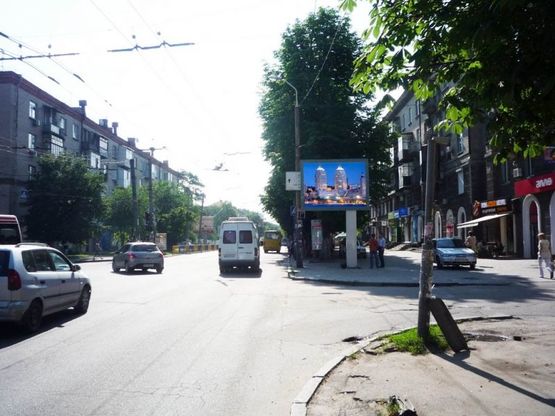 Фото рекламной плоскости по адресу s064А6,вул. Титова, 11 - просп. О. Поля (Кірова), магазин Алло