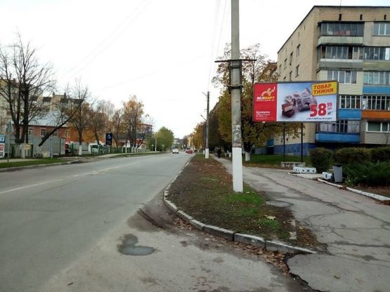 Фото рекламной плоскости по адресу м. Обухів, вул.Київська, 31 (навпроти Обухівської автошколи товариста сприяння обороні України)