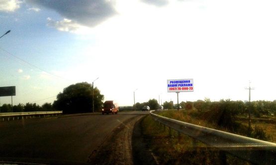 Фото рекламної площини за адресою Трасса Р-69, за автобусной остановкой с. Осещина, слева