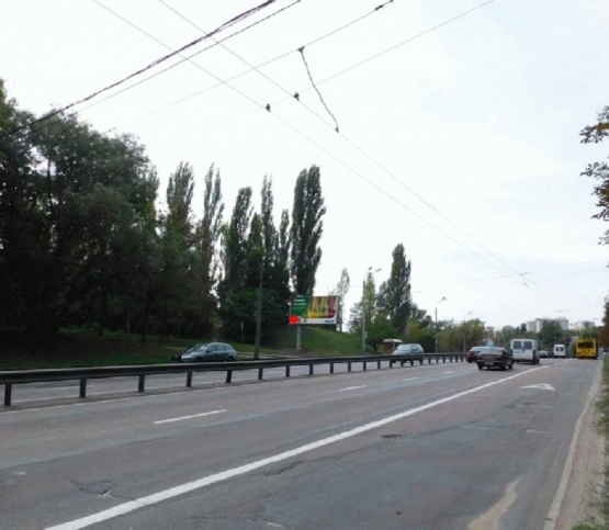 Фото рекламной плоскости по адресу Телиги О.ул., от ул. Фрунзе в сторону ст.метро "Дорогожичи", напротив АЗС