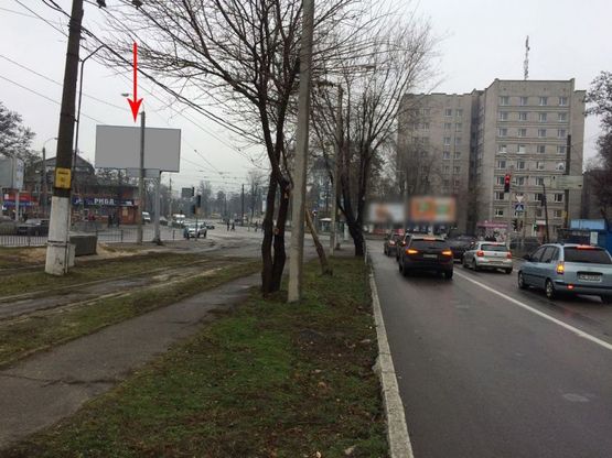 Фото рекламной плоскости по адресу s070Б,вул. Робоча - вул. В. Антоновича (Свердлова), світлофор, маг. АТБ
