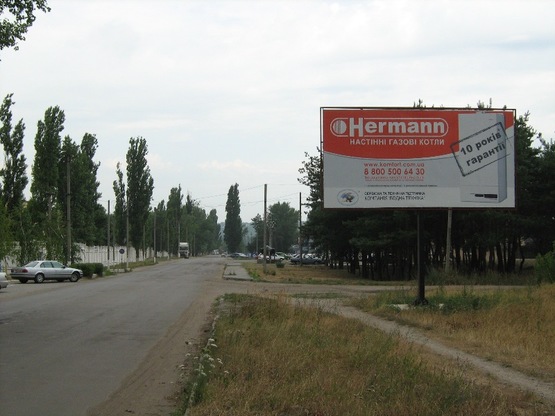 Фото рекламной плоскости по адресу вул. Дружбы, навпроти "Спец залізобетон"