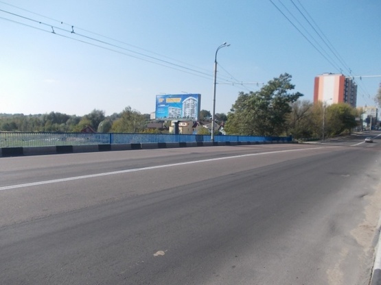 Фото рекламной плоскости по адресу Ковельська міст_до гуртівні ПАККО_від Центрального ринку