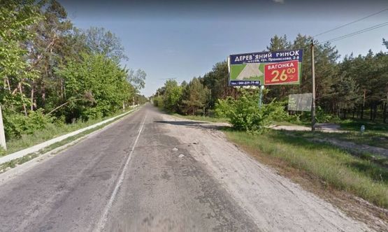 Фото рекламной плоскости по адресу В'їзд в Українку з Києва,  перед поворотом  на дамбу
