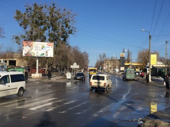 Фото рекламной плоскости по адресу вул. Павліченко, навпроти АЗС, біля павільйону "Флінт"