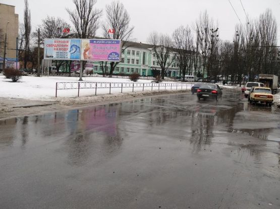 Фото рекламной плоскости по адресу Пл. Петра Запорожца (призматрон) напрямок в центр
