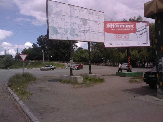 Фото рекламної площини за адресою вул. Виконкомовська, 1 (р-н З/Д моста)