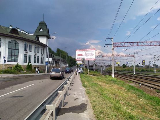 Фото рекламной плоскости по адресу Залізничне шосе/вул. Тимірязєвська перехрестя, в напрямку Столичного шосе