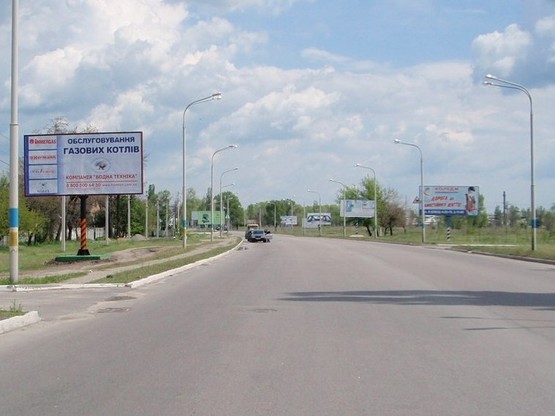 Фото рекламной плоскости по адресу вул. Дніпровська, 383, виїзд на м.Донецьк