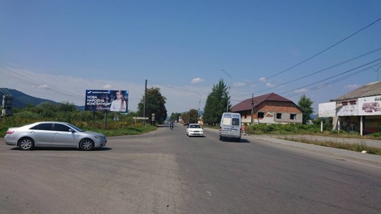 Фото рекламной плоскости по адресу м. Хуст, вул. Івана -Франка,в'їзд в місто Хуст, поворот на с.Шаян, с.Велятино