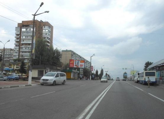 Фото рекламной плоскости по адресу м. Обухів, вул..Київська, 117,  біля супермаркета "Велика кишеня"  (автозупинка  "Піщана")