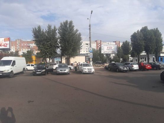 Фото рекламной плоскости по адресу м. Обухів, вул. Київська, 117, біля супермаркета "Велика кишеня" (автозупинка "Піщана")