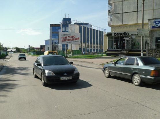 Фото рекламной плоскости по адресу Вул. Шевченко буд. 146 біля м-ну "Автолюкс" та автосервісу Renault