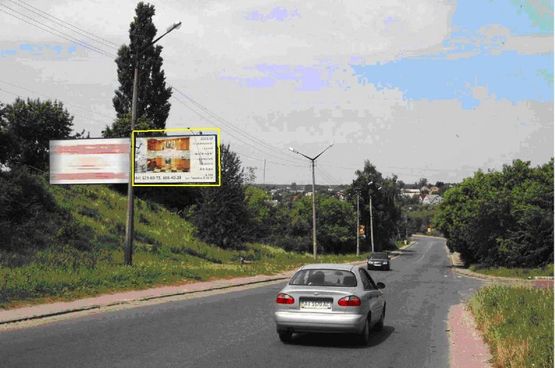 Фото рекламной плоскости по адресу ул. Героев Танкистов, ГАИ, из центра, к жилмассивам Журавлёвка, Кадлубица, дорога на Житомир (справа)