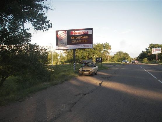 Фото рекламной плоскости по адресу Въезд  от с. Орлик