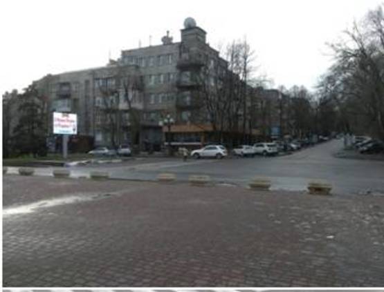 Фото рекламной плоскости по адресу пл.Шевченко, ул.Яворницкого, Ресторан Чарли, Вход парк Шевченко *анимация