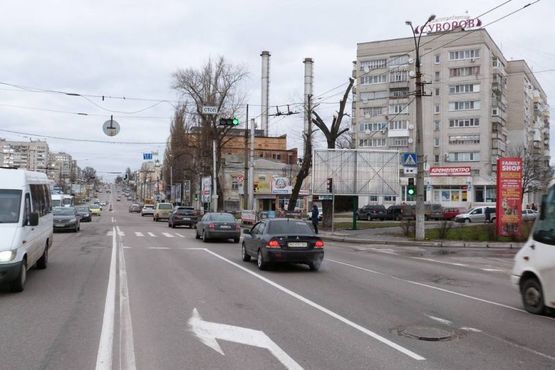 Фото рекламной плоскости по адресу просп. Свободы (ул.60л.Октября), перекр. с ул. Чкалова, возле Электростанции, напротив автошколы «СИЮЖ», самая крупная транспортная развязка