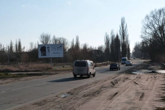 Фото рекламной плоскости по адресу ул. Занасыпский Шлях, напротив табачной фабрики "JTI", р-н авторынка