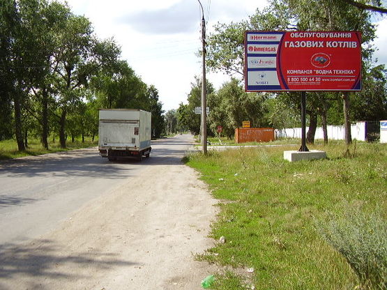 Фото рекламной плоскости по адресу ул. Артема (южный въезд в город)
