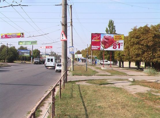 Фото рекламной плоскости по адресу ул. Е. Тельнова (пр. Правды), п-я Челентано, обл. больница