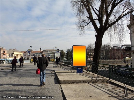 Фото рекламної площини за адресою пл.Ш.Петефі(вихід на пішох.міст), піш.зона, напр-пл.Театральна