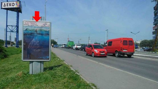 Фото рекламной плоскости по адресу Рыбалка М. ул., 2а, возле ТРЦ"Оазис", №2