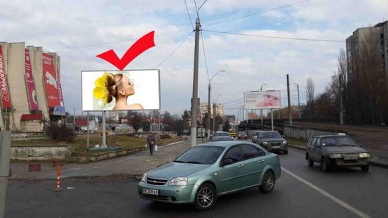 Фото рекламной плоскости по адресу вул.Кн.Ольги 106, універмаг Львів, до вул.В.Великого