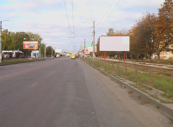 Фото рекламной плоскости по адресу ул. Е. Тельнова (пр.Правды), меб. салон БРВ, АТБ, парк