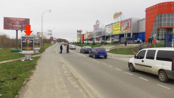 Фото рекламной плоскости по адресу Рыбалка М. ул., 2а, возле ТРЦ"Оазис", №9
