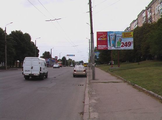 Фото рекламной плоскости по адресу ул. Вокзальная (ул. Окт. Революции), стомат. Поликлиника