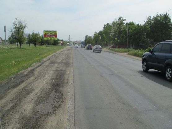 Фото рекламної площини за адресою Oдесса-Б.Днестровский Прилиманское 2 Б (в стор. Б-Днестр.)