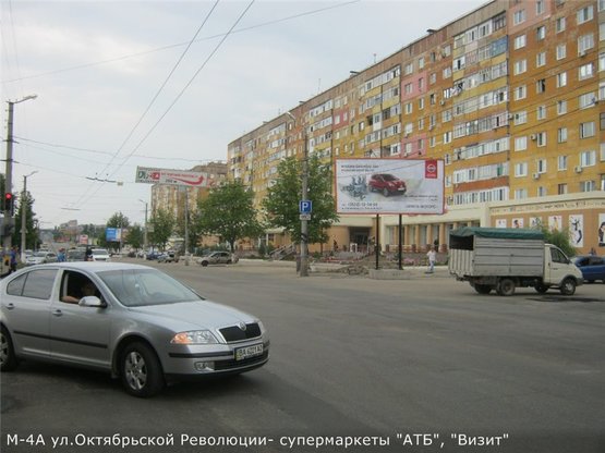 Фото рекламной плоскости по адресу ул Окт Революции - супермаркет "АТБ" Ковалевка