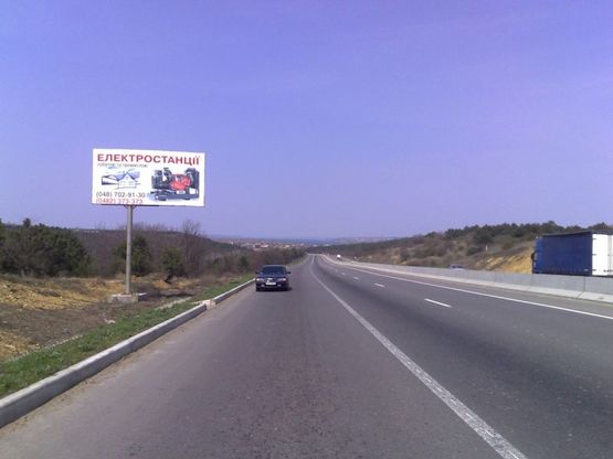 Фото рекламной плоскости по адресу Трасса  Киев-Одесса 449+200 Б (в стор. Киева перед Родничком)