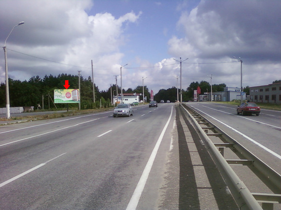 Фото рекламної площини за адресою Каменецкое шоссе, возле аэропорта, рын-ка "Караван"