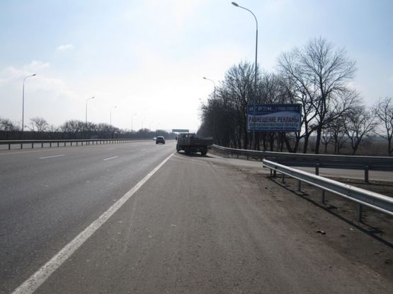 Фото рекламной плоскости по адресу Трасса  Киев-Одесса 451+800 A (в стор. Одессы, выезд с. Дачное)