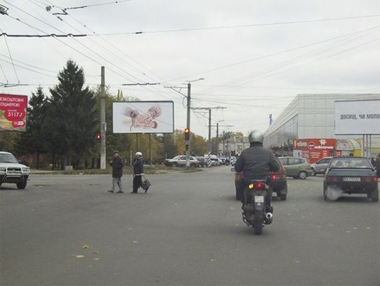 Фото рекламной плоскости по адресу Тамма ул.  от  Яновского ул.