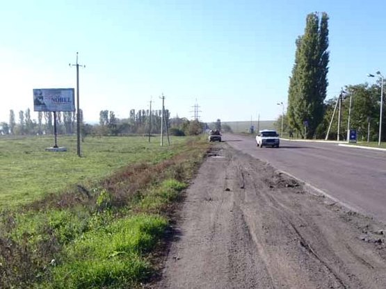 Фото рекламної площини за адресою Марьинское, ул. Первого мая, р-н АЗС, выезд на Каховку