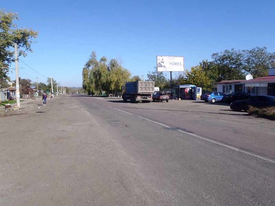 Фото рекламной плоскости по адресу Марьинское, ул. Первого мая, р-н рынка