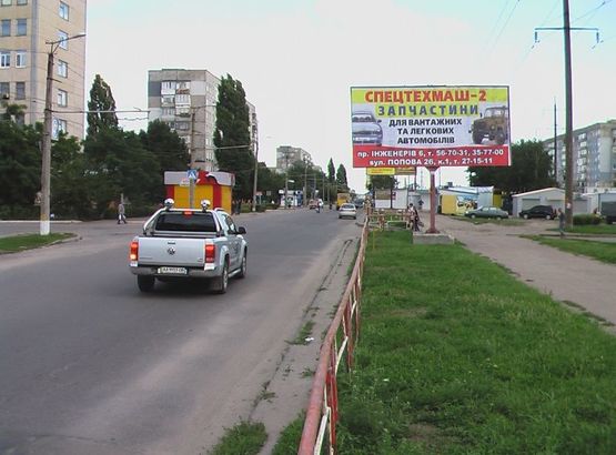 Фото рекламной плоскости по адресу ул. Попова, супермаркет АТБ