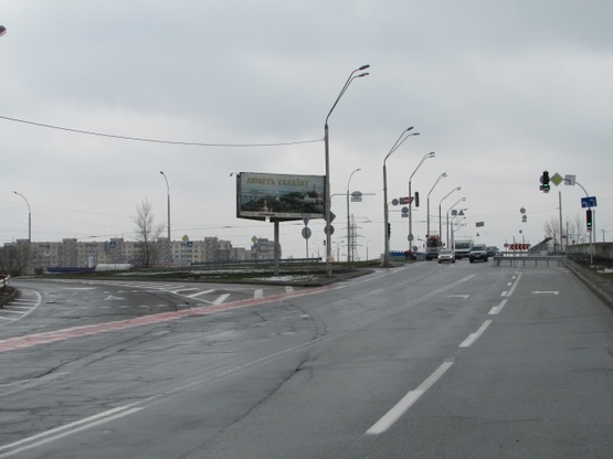 Фото рекламної площини за адресою Бальзака, 2-а перед МсDonalds (разделитель на выезде с просп. Ватутина )