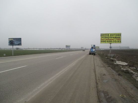 Фото рекламной плоскости по адресу Объездная дорога 21+00 А (от клев. моста в стор. 2 столбов)