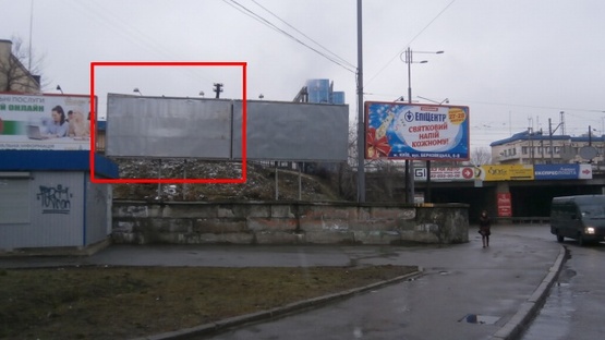 Фото рекламної площини за адресою Василия Липковского ул. (Урицкого) /  Николая Осровского ул. (Максима Кривоноса площадь), возле ж/д моста (левый)